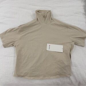 Lululemon Athletica Sand Short Sleeve Top